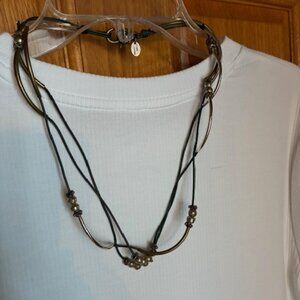 Lizzy James necklace / wrap bracelet. Leather and sterling silver.